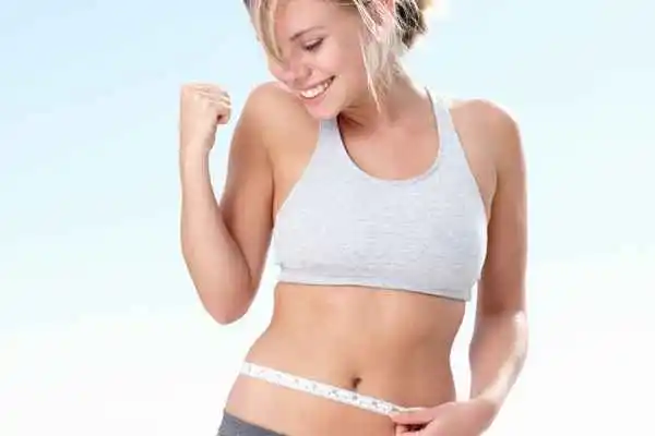 woman happy after fat reduction treatment Winchmore Hill