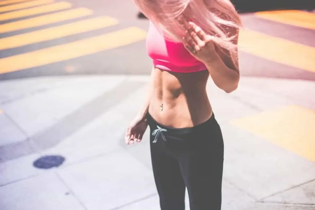 Woman with toned stomach after LA-EMS Body Sculpting Treatment Winchmore Hill